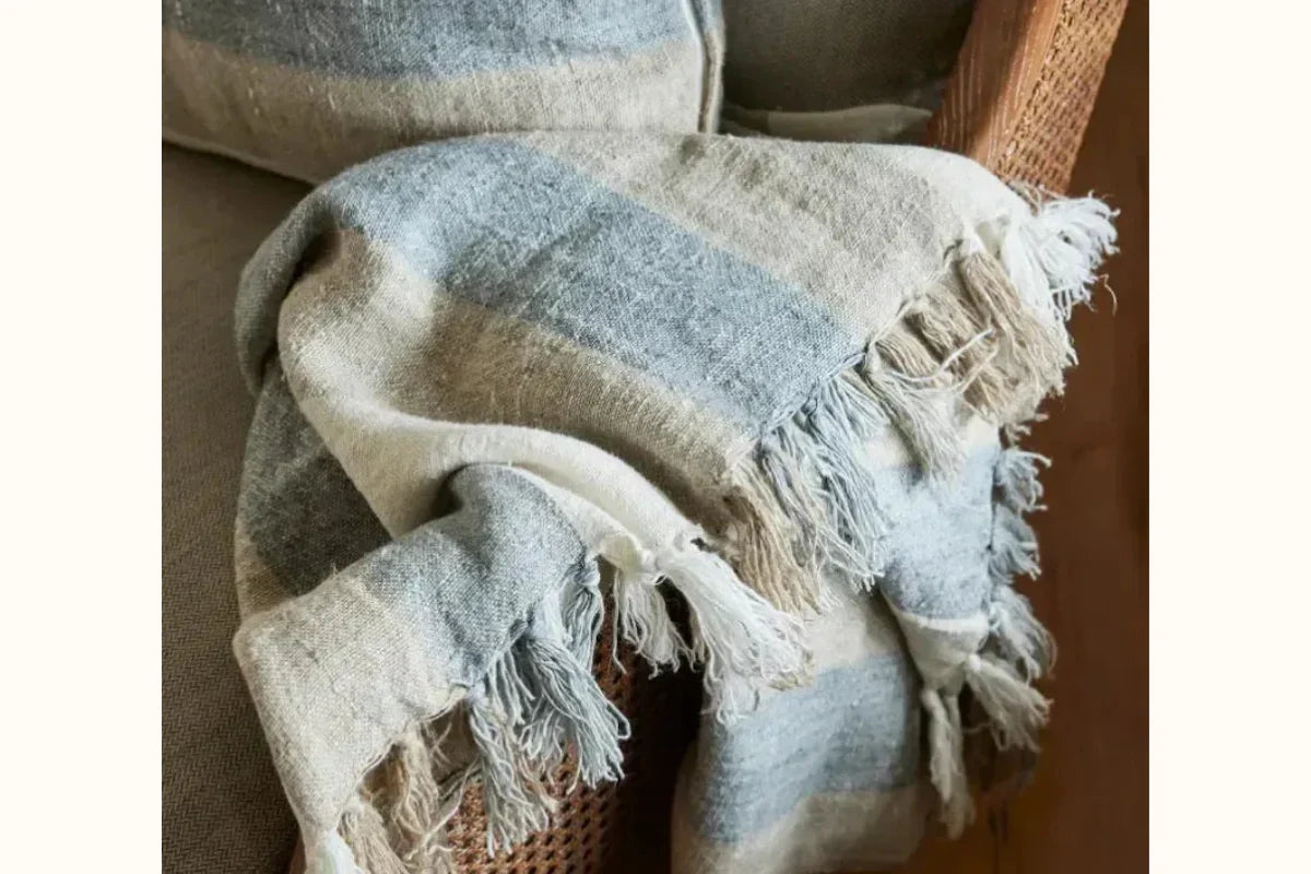 How to Layer Throws and Cushions Like an Interior Stylist