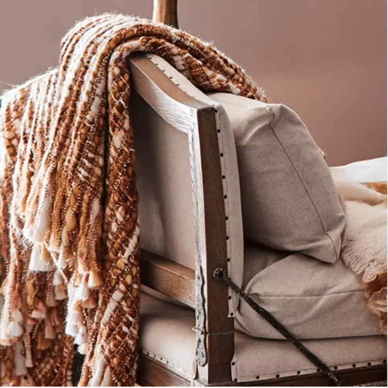 How to Layer Throws and Cushions Like an Interior Stylist