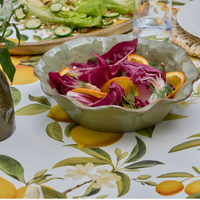 Thumbnail for Marseille green wavy bowl filled with radicchio and orange salad on a citrus print tablecloth