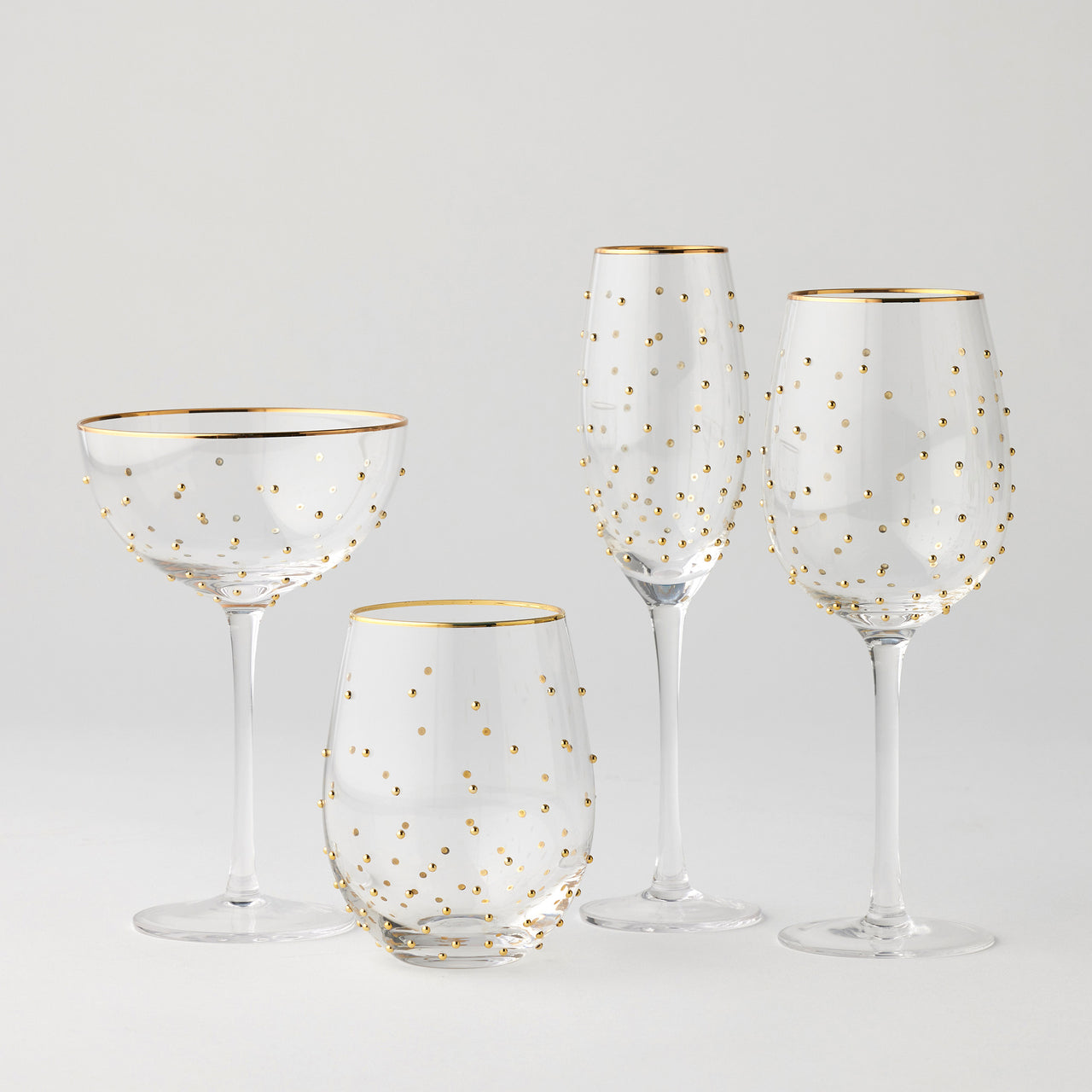 Dotti glassware range with raised gold dots: wine glasses, champagne flutes, coupes and tumblers | House of Dudley