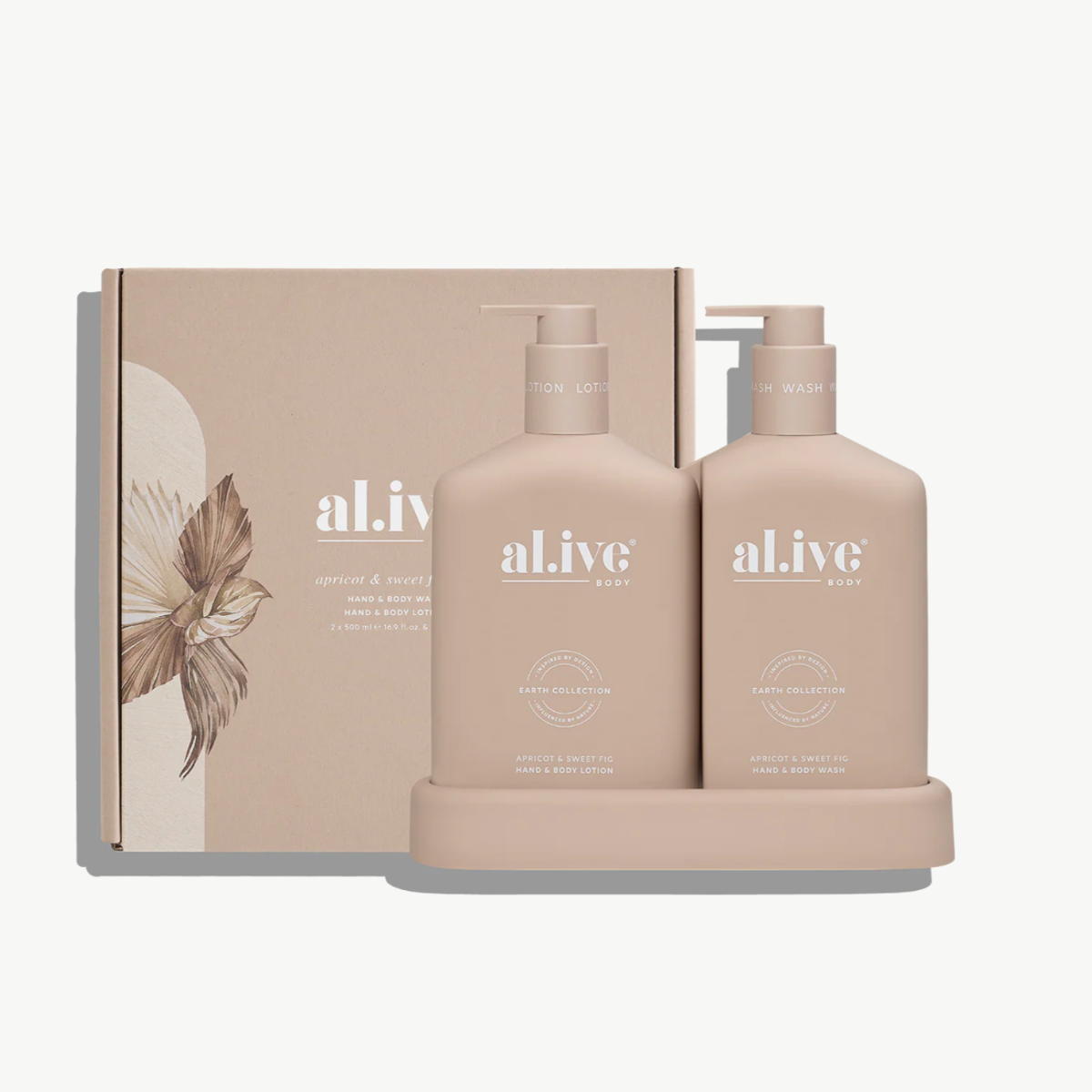 al.ive Apricot and Sweet Fig hand wash and lotion duo in a ceramic tray