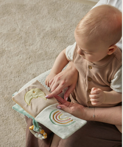 Baby reading the sage green teddy bear activity fabric book