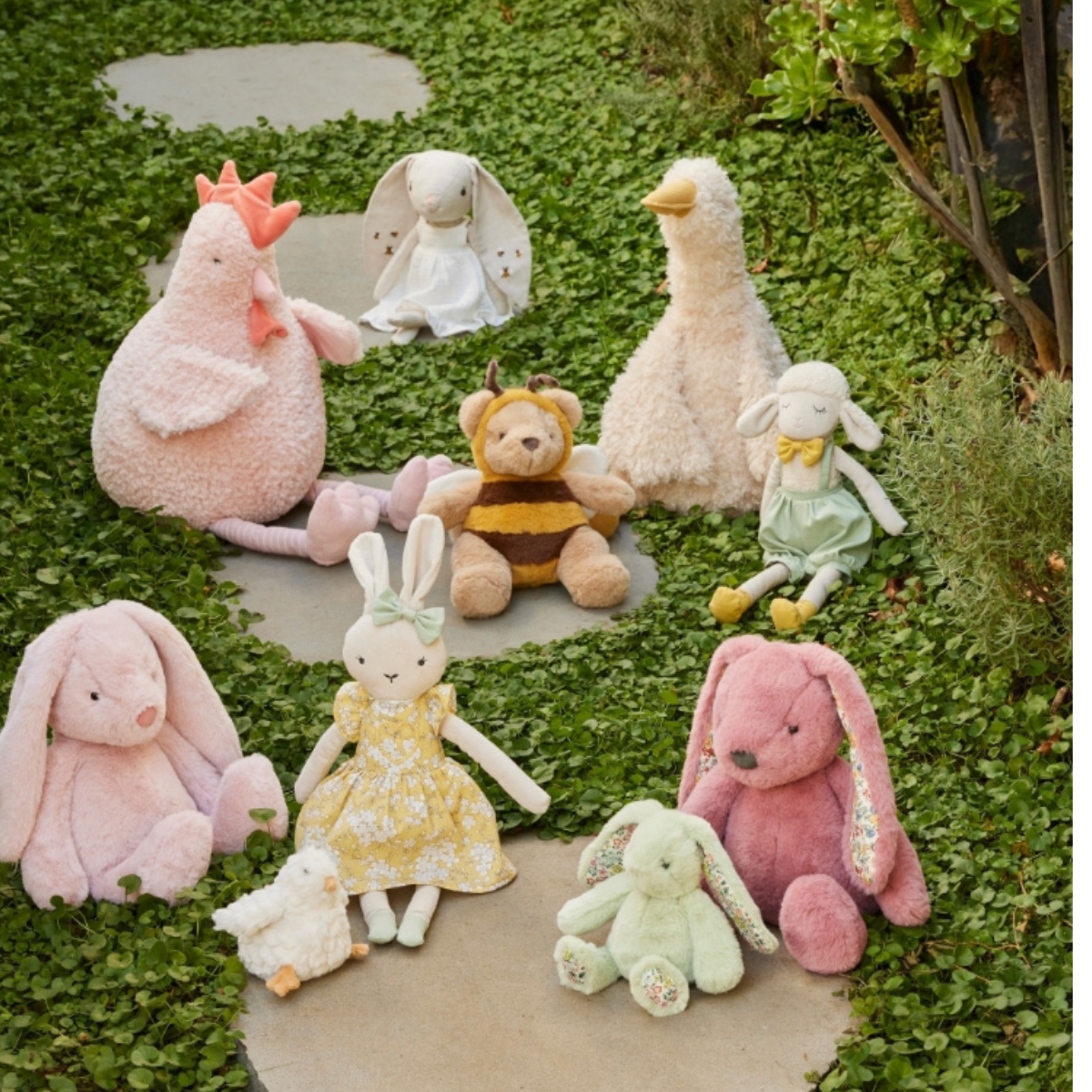 Stanley plush sheep soft toy, alternate view styled with flowers