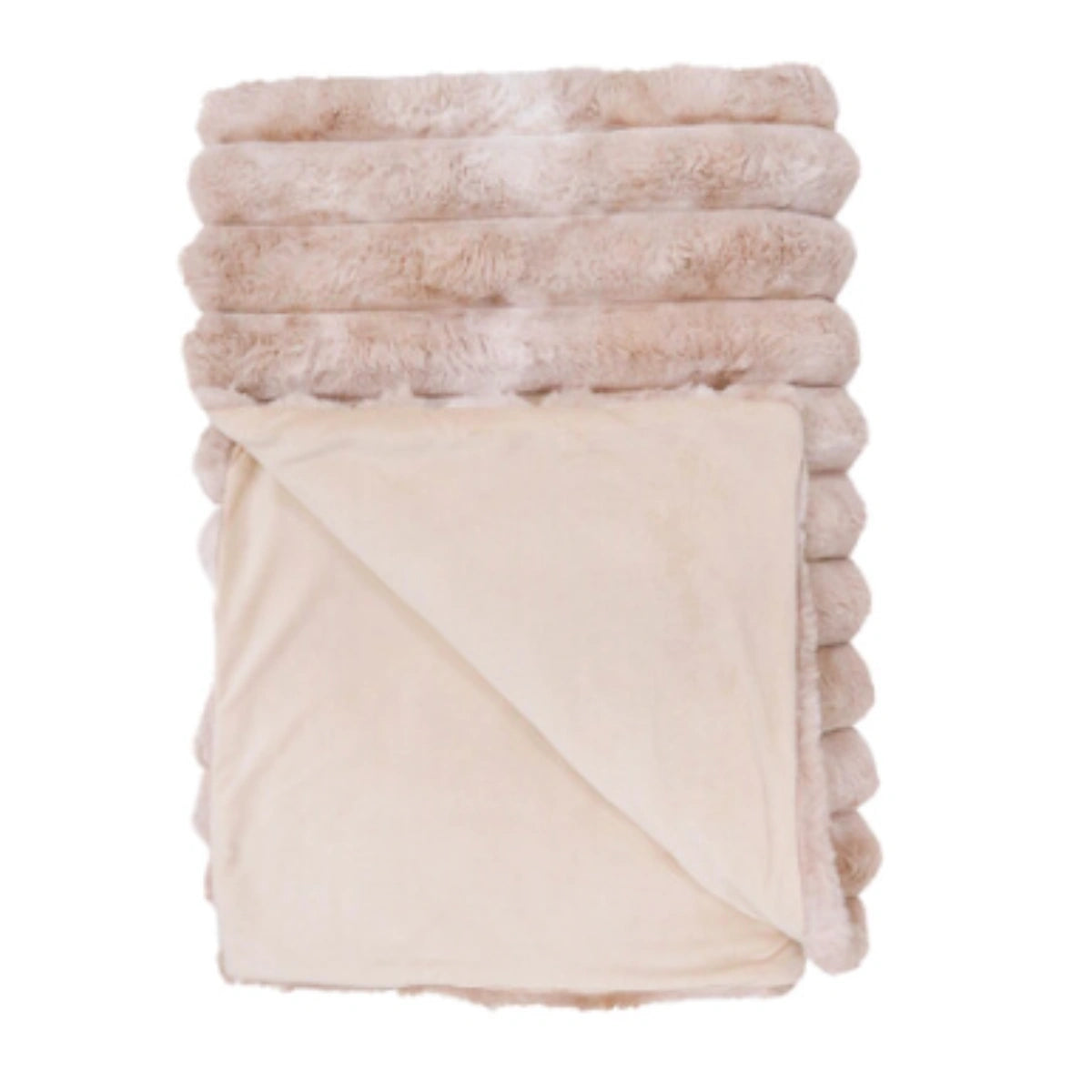 Dappled crepe puffer faux fur blanket draped over a sofa