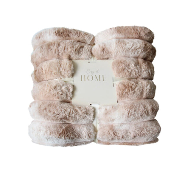 Close detail of the dappled crepe faux fur texture and quilted puffer stitching