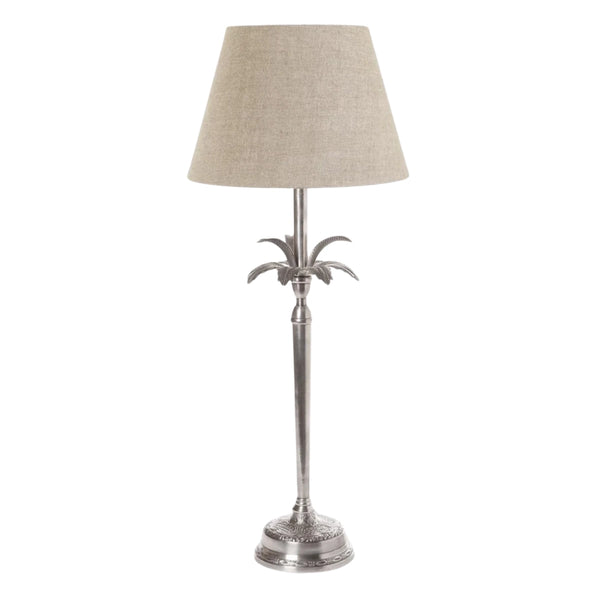 Casablanca palm tree table lamp base in antique silver brass, shown with a natural linen drum shade