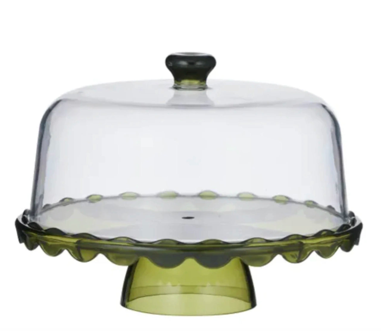 Green glass cake stand with a clear dome lid on a white background