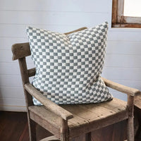 Thumbnail for Gambit cushion in off-white and blue cotton jacquard, on a sofa