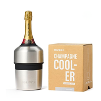 Thumbnail for HUSKI champagne cooler with a bottle of champagne and its packaging on a white background