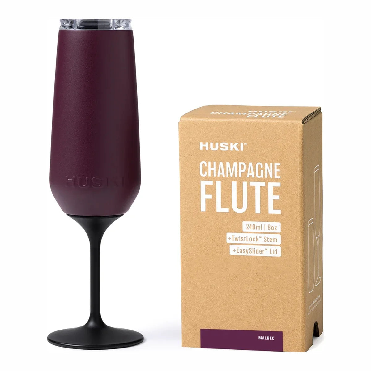 Huski Champagne Flute in Malbec with black TwistLock stem and clear lid, beside its kraft gift box | House of Dudley