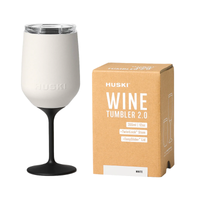 Thumbnail for White wine tumbler with black stem next to its packaging box on a white background