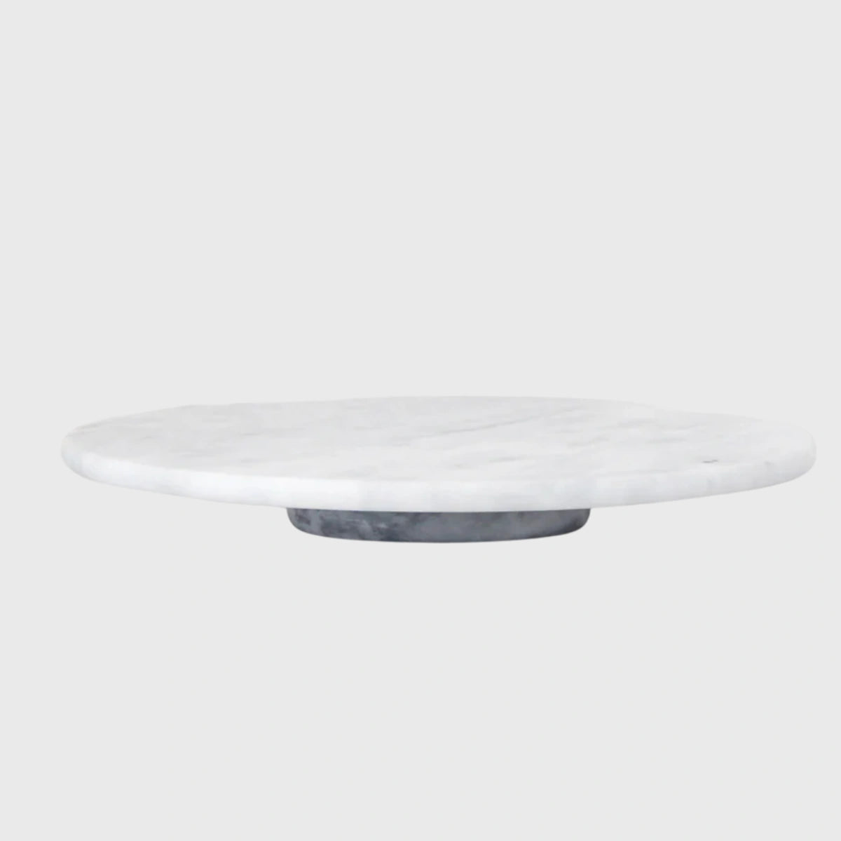 Round marble cake stand on a white background