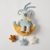 Thumbnail for Plush koala soft toy sitting on a mustard banana with three hanging stars, in blue and mustard tones