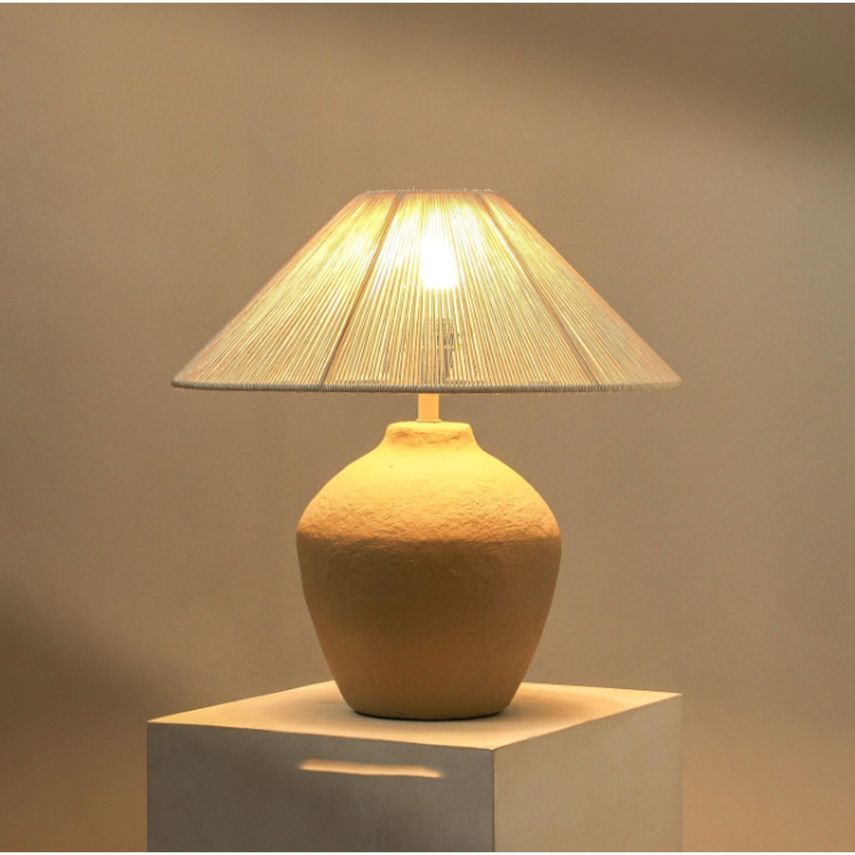 Ossu Table Lamp Sand - lit ambience