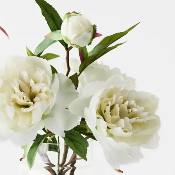 Faux peony flower mix arranged in a vase