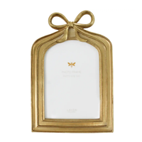 Thumbnail for Gold resin photo frame with a ribbon bow across the top, sized for a 5x7 photograph