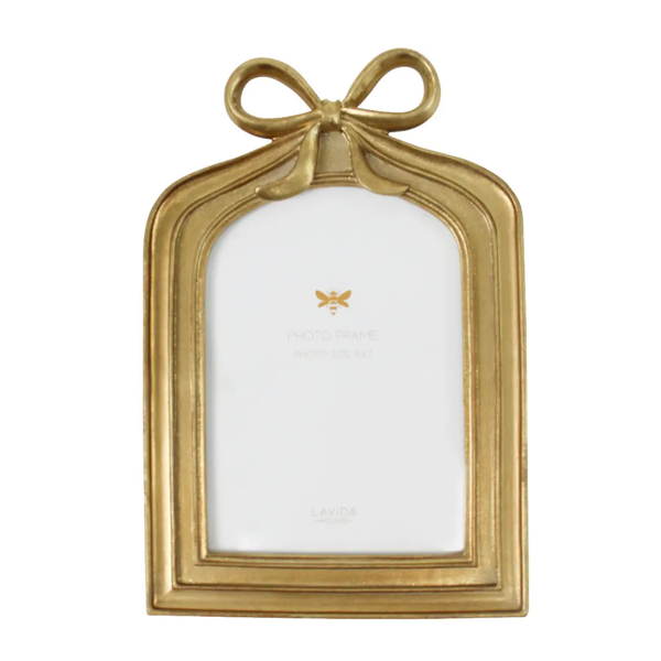 Gold resin photo frame with a ribbon bow across the top, sized for a 5x7 photograph