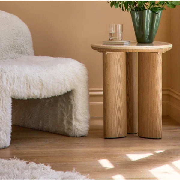Carlyle brown marble side table shown from a second angle, showing the veined marble top and oak-toned base
