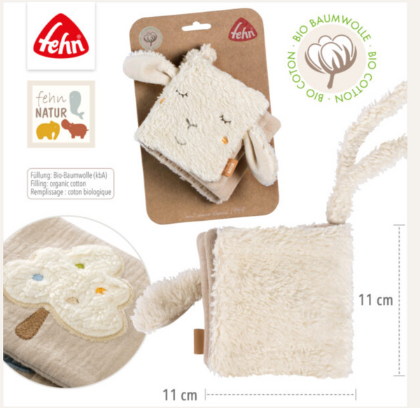 Organic cotton sheep soft baby book, open to show the crinkle pages and mirror