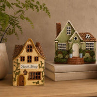 Thumbnail for Book Shop tealight holder, alternate view with other village houses