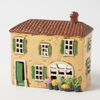 Thumbnail for Meadow Lane tealight holder, soft yellow stoneware village house with potted flowers