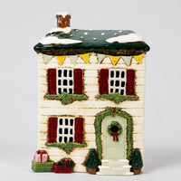 Thumbnail for Winterberry Lane tealight holder, snowy hand-painted stoneware Christmas cottage with green shutters